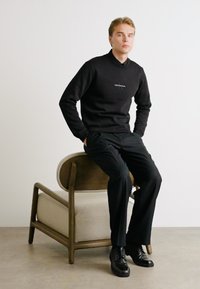 Calvin Klein Jeans MONOLOGO CREW NECK - Felpa - black