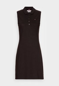 Abito polo senza maniche di colore nero con colletto, caratterizzato da una chiusura a bottoni e un piccolo logo sul petto. Realizzato in morbido cotone elasticizzato.