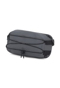 Borsa da viaggio grigia realizzata in materiale resistente con forma rettangolare. Presenta cinturini elastici e una chiusura con zip, logo del marchio sul lato.