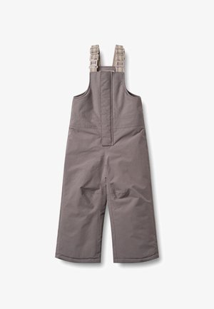 Szürke vízálló overál állítható pántokkal, bő szárakkal és két első zsebbel. Simább textúra megerősített varrási részletekkel.
