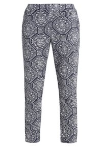 Pantalons navy et blancs avec un design octagonal, fabriqués en tissu léger. Coupe ajustée avec une texture lisse et sans quincaillerie visible.