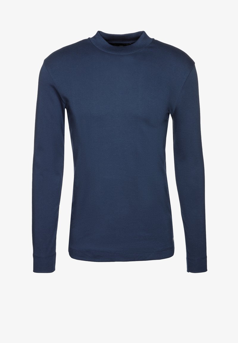Mörkblå långärmad t-shirt med hög hals. Tillverkad av mjuk bomull, har en kroppsnära passform och minimala sömnadsdetaljer. Slät textur.