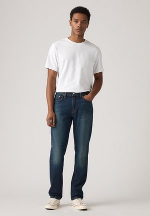 ATHLETIC - Straight leg jeans - field work