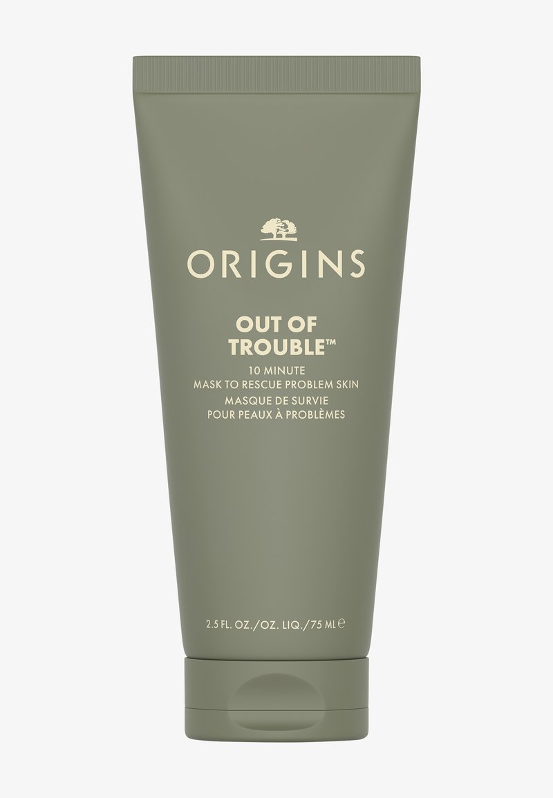 Tube verte avec un capuchon à bascule, étiqueté "OUT OF TROUBLE™" en texte blanc. Contient 2,5 fl. oz. d'un masque facial pour peau à problèmes.