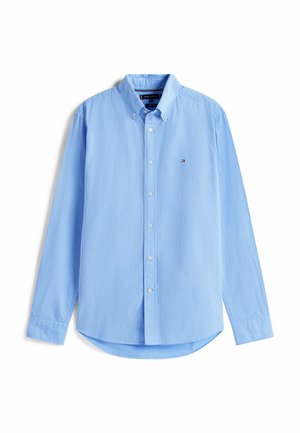 Camicia a maniche lunghe a quadri blu chiaro con colletto a punta, bottoni frontali e un piccolo logo sul lato sinistro del petto. Tessuto in cotone.