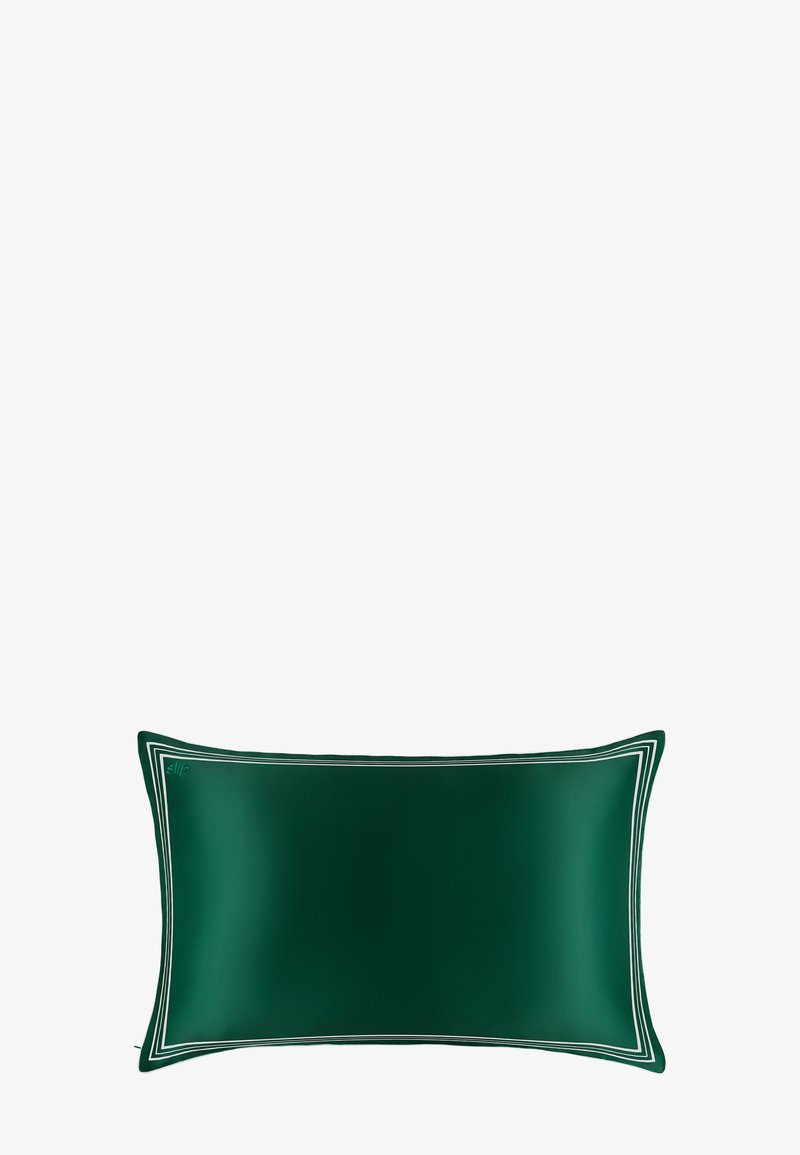 Coussin rectangulaire vert foncé avec un motif de bordure à double ligne blanche sur un fond blanc.