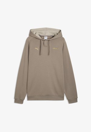 Sweat à capuche beige à manches longues avec cordons, doublure intérieure à carreaux, logo Puma doré sur la poitrine gauche et petit emblème doré sur la poitrine droite.