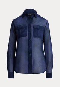 Navy blue sheer button-up shirt with two chest pockets, long sleeves, and a pointed collar; features a smooth fabric texture.