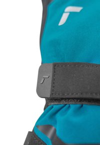 Blue fabric glove with black accents, featuring a textured surface and adjustable strap. Logo visible on the strap.