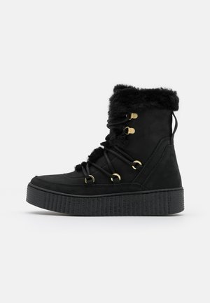 Bottines à plateau - black