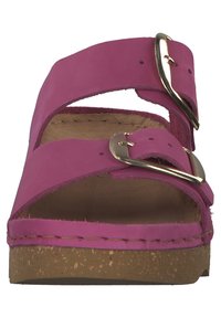Fuchsia leather sandals with two adjustable straps and a gold buckle. Cork footbed with stitching detail along the edge.