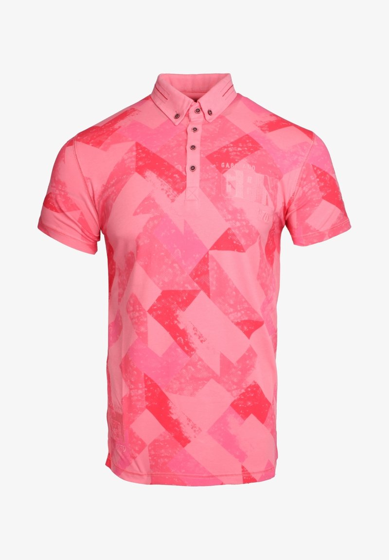 Polo rose avec des motifs géométriques dans différentes nuances de rose, à manches courtes et avec une patte de boutonnage à trois boutons. Fabriqué à partir d'un tissu lisse.
