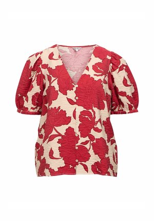 Kortärmad blus med v-ringning i krämfärgad tyg med en texturerad yta och djärvt röd blommönster; har knappar framtill.