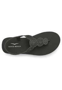 Infradito neri con una suola strutturata, caratterizzati da una fascia intrecciata decorata con accenti di perline circolari. Marcati "Venice Beach."