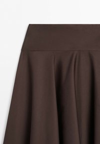 Dark brown skirt with wide waistband and subtle pleats, shown flat against a white background.