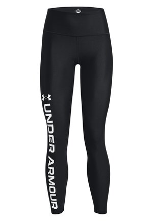 Black athletic leggings made of stretchy material with a high waist, featuring a large white "UNDER ARMOUR" logo along the left leg.