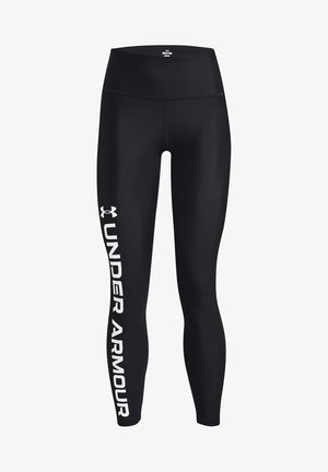 Black athletic leggings made of stretchy material with a high waist, featuring a large white "UNDER ARMOUR" logo along the left leg.