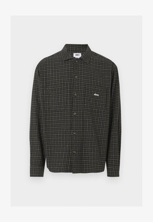 Roheline ja must ruuduline nööbiga särk pika varrukaga, kahe rindkere taskuga ja väike valge logo vasakul küljel.