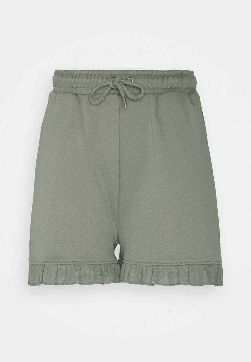 Short décontracté vert clair avec taille élastique, lien à nouer et ourlet à volants sur fond uni.