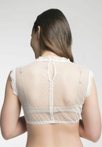 Durchsichtiges weißes gepunktetes BH mit kurzen Spitzenärmeln, einem Schlüssellochverschluss im Rücken und dezenten Stecknähte entlang der Kanten.