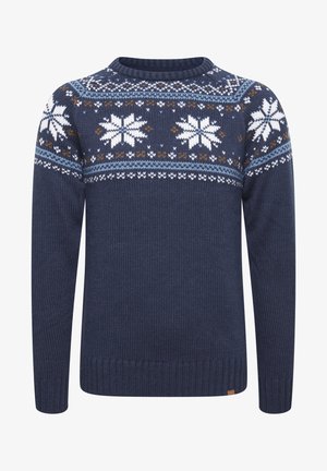 Tumed sinine kudumisest soe kampsun, ümmarguse kaelusega, millel on valged lumehelbe mustrid ja pruun/kirjud triibud ülaosas. Tekstuuriga kangas.