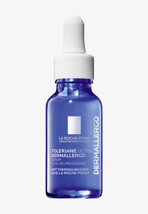 Blue glass dropper bottle with a white cap, labeled "TOLERIANE ULTRA DERMALLERGO SERUM," featuring clear text on the front.