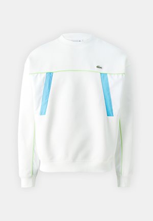 White sweatshirt with blue and green accents, featuring a textured fabric, round neckline, and a small logo on the chest.