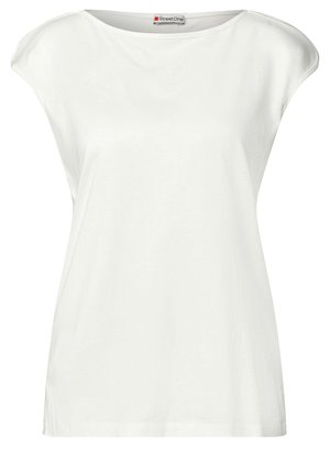Top blanco de manga corta hecho de suave algodón, con un escote redondo y hombros ligeramente caídos. Presenta una textura lisa y un corte relajado.