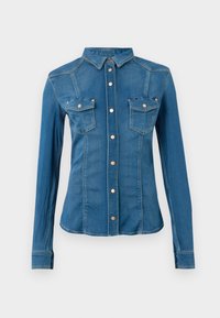 Camicia di jeans, azzurro chiaro, maniche lunghe, chiusura con bottoni, due tasche sul petto con alette a bottone, cuciture a contrasto, design aderente.
