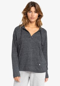 Charcoal gray hoodie made of soft fabric, featuring a v-neck, long sleeves, a front pocket, and a logo accent at the hem.