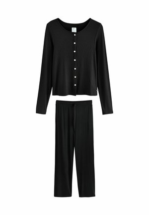 Schwarzes Loungewear-Set bestehend aus einem Langarmoberteil mit Knopfverschluss und weitem Hose mit elastischem Bund, aus weichem, geripptem Stoff gefertigt.