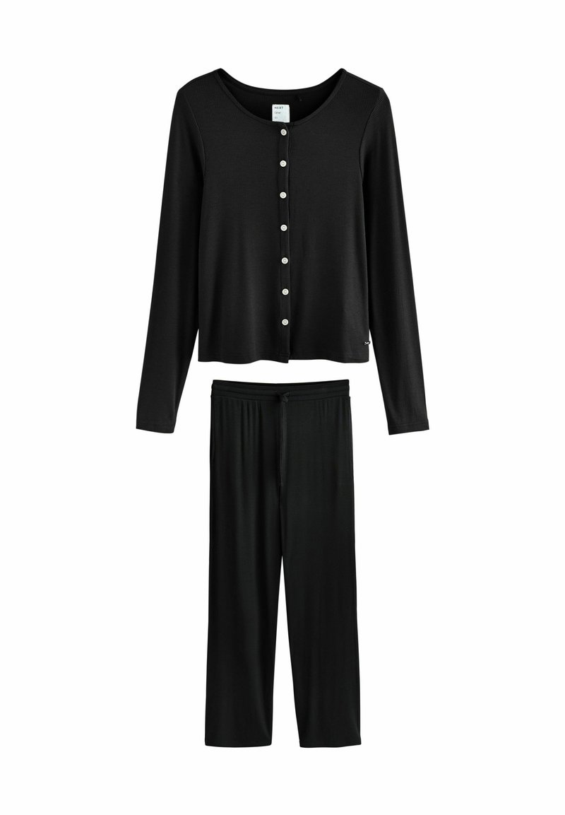 Schwarzes Loungewear-Set bestehend aus einem Langarmoberteil mit Knopfverschluss und weitem Hose mit elastischem Bund, aus weichem, geripptem Stoff gefertigt.