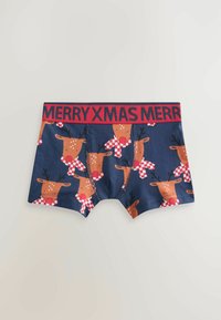 Boxerii în nuanță de albastru marin cu un model repetat de reni purtând eșarfe în carouri roșii și albe. Banda de talie roșie cu textul "MERRY XMAS".