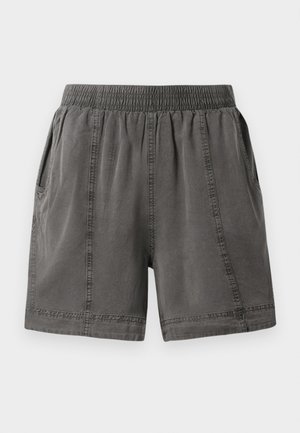 Pantaloni corti grigi in cotone misto con cintura elastica, tasche laterali e dettagli cuciti lungo le cuciture. Texture morbida e vestibilità casual.