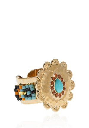 Gold ring with scalloped edges features a blue teardrop stone surrounded by small brown stones and a woven band of black, turquoise, orange, and gold beads.
