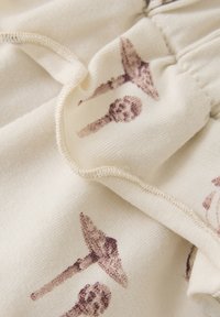 Minymo ALL OVER PRINT - Leggings - Hosen - sandshell