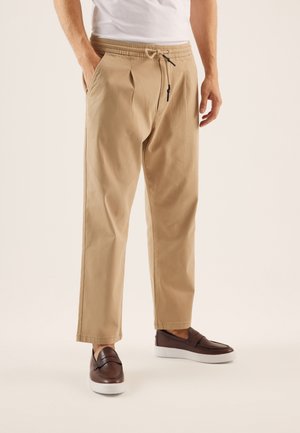 Pantaloni - beige
