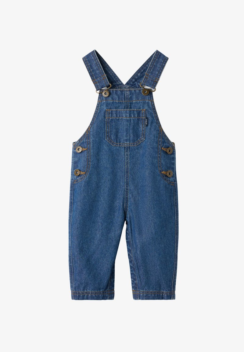 Denim overal met verstelbare banden, grote voorzak en zijknopen. Donkerblauwe kleur met zichtbare stiksels en een losse pasvorm.