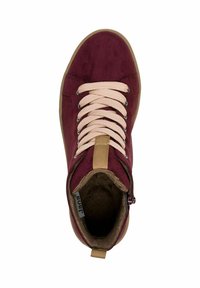 Burgundy suede high-top sneaker with beige laces, a tan accent at the heel, and a fuzzy interior lining. Features a side zipper for ease.