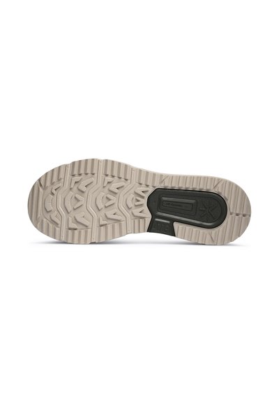Suola della scarpa in gomma beige con un motivo di battistrada testurizzato, inclusa un'accensione nera al centro con un logo. Design robusto e grip multidirezionale.