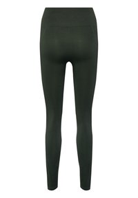 Leggings vert foncé fabriqués en tissu extensible et texturé. Dotés d'une taille haute et d'un élément de design en forme de V à l'arrière.