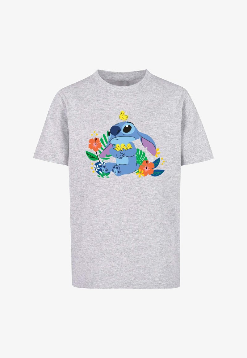 Camiseta de algodón gris con un gráfico colorido de un personaje alienígena azul rodeado de pollitos amarillos, acompañado de flores y hojas tropicales.