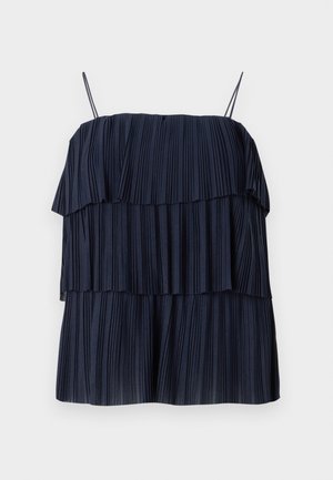 Tumedat sinised volditud topid kihilise kujundusega, õhukeste rihmadega ja pehme tekstuuriga. Igal kihil on vertikaalsed voldid, mis loovad sügavust ja liikumist.