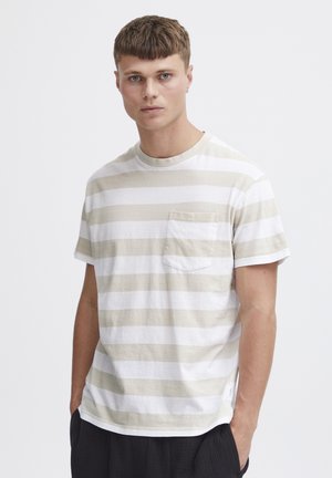 Short-sleeve, crew-neck shirt in beige and white stripes, featuring a left chest pocket and cotton fabric with a smooth texture.
