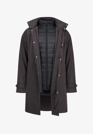 Wodoodporna brązowa kurtka z zapięciem na napy, z odpinaną czarną ocieplaną podszewką i regulowanymi mankietami.