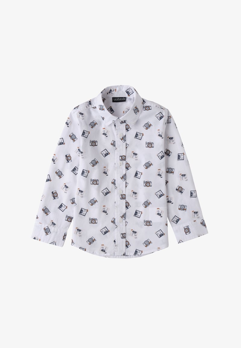 Camisa blanca de botones con un patrón de cámaras y perros de dibujos animados. Manga larga con puños, hecha de tela ligera.