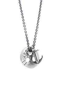 Silver-tone necklace featuring a circular pendant with two holes, engraved markings, and an anchor charm attached to the pendant.