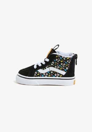 Black high-top sneaker with white laces, white stripe, and colorful floral pattern on the sides, with a zipper at the back.