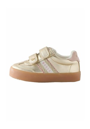 Child's gold sneaker with two velcro straps, pink and white side stripes, and a brown rubber sole on a white background.