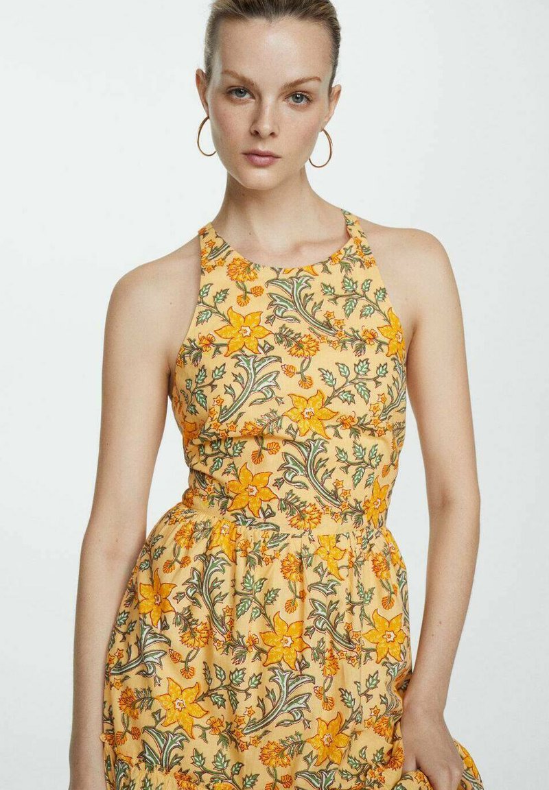 mango yellow maxi dress Cassiopeia Open Back String Tie Maxi Dress Mango